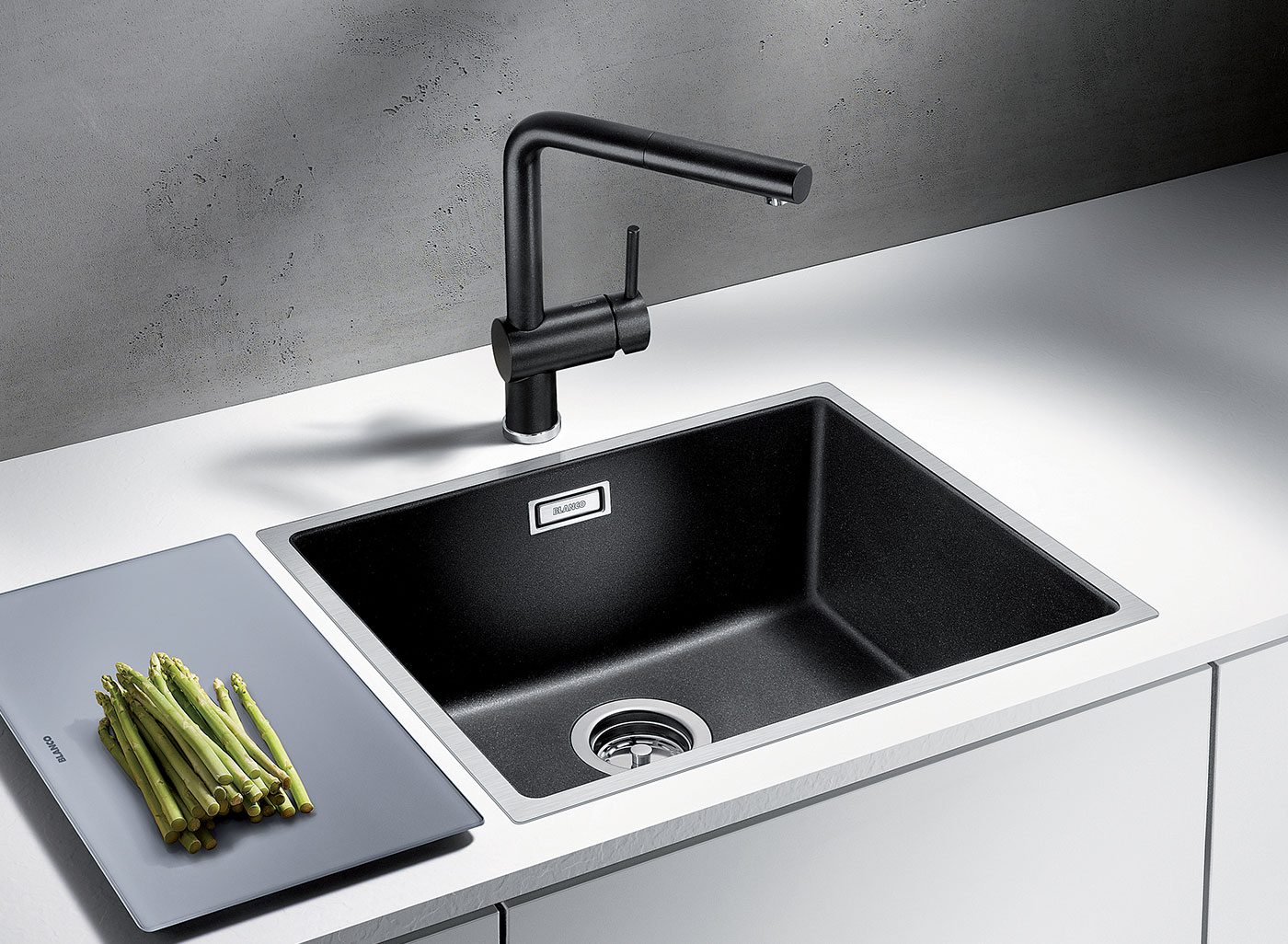 or flush mounted into stone and glass. It's a great match for high quality induction and ceramic cooktops and features an integrated overflow.