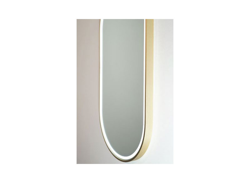 and the backlit aura of light that it emits gives the mirror a sense of exclusivity. With the practical luxury of an in-built demister that defogs the mirror after a hot shower